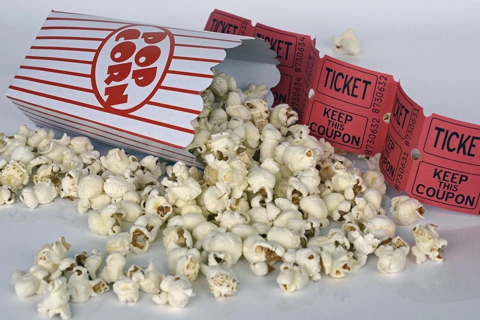 Movie tickets and popcorn.