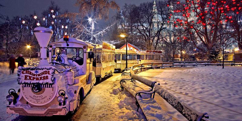 Vienna christmas market train in snow at night